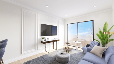 a living room with a blue couch and a tv